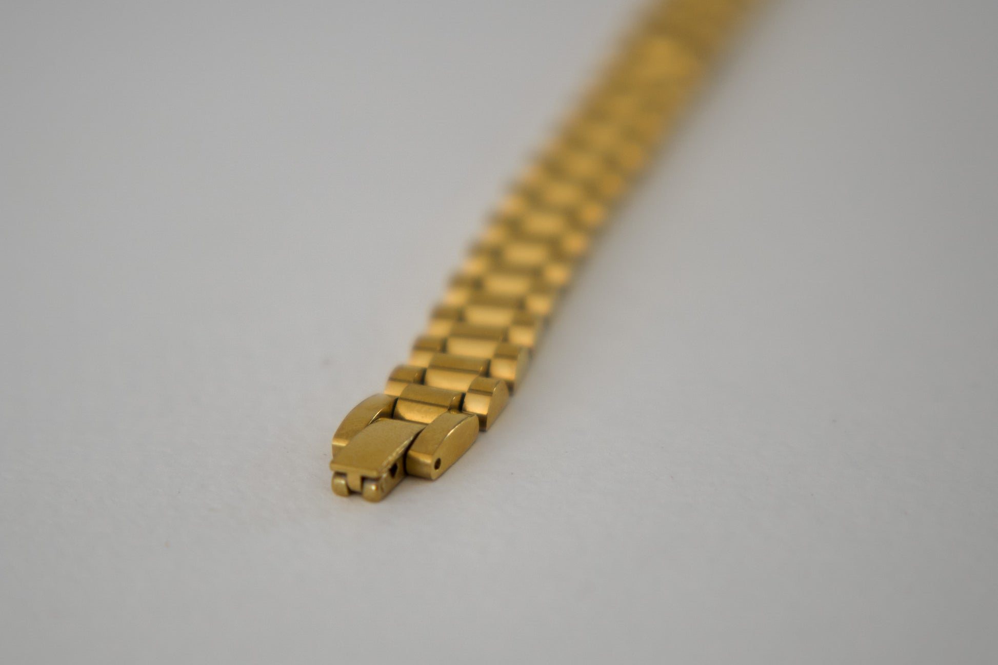 Gold president link bracelet worn on wrist, 18k gold plated stainless steel, Mac&Coco South Africa