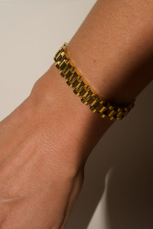 Gold president link bracelet worn on wrist, 18k gold plated stainless steel, Mac&Coco South Africa"